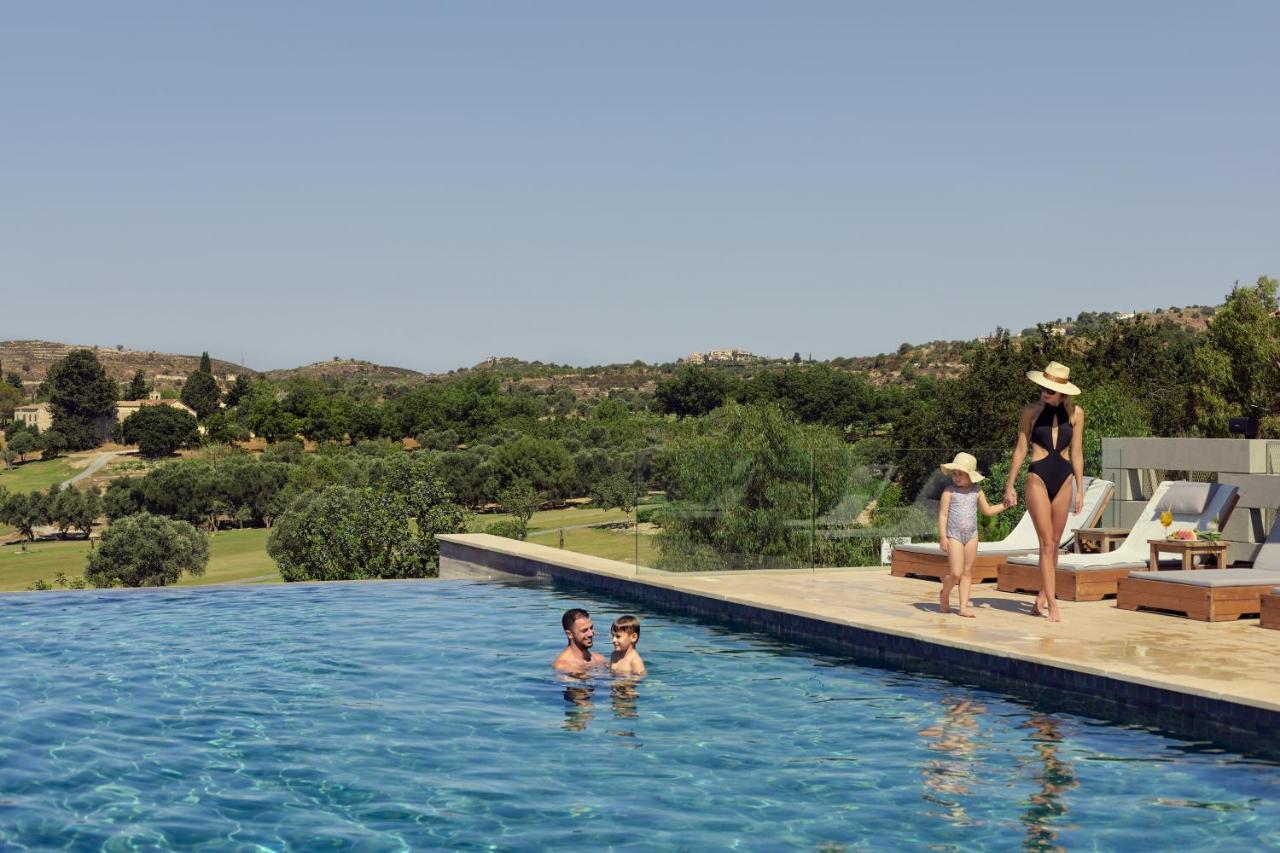Minthis Resort Tsadha 외부 사진 The pool at the hotel