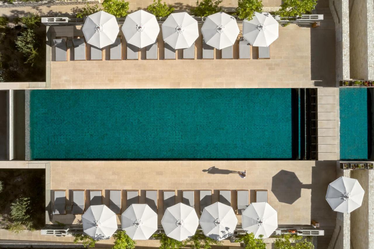 Minthis Resort Tsadha 외부 사진 Aerial view of the pool at the Hotel